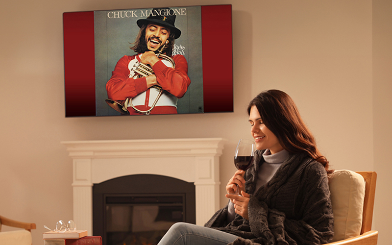 Home hi-fi with album art on screen
